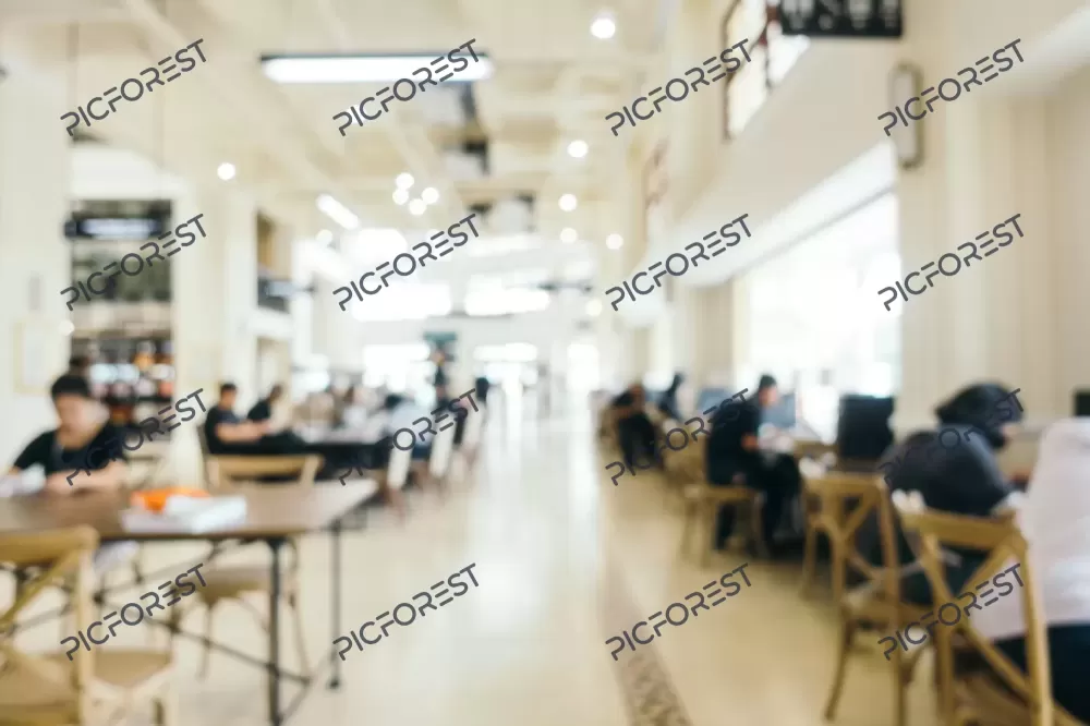 دانلود عکس افراد حاضر در یک کتابحانه در حال مطالعه